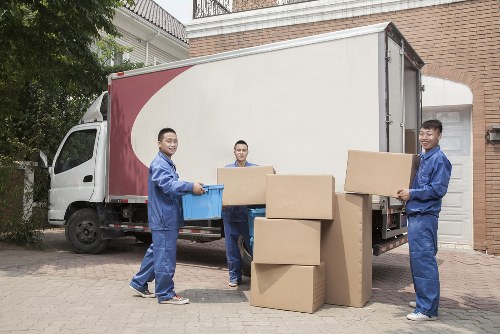 Loading boxes and household items for a move in Ilford