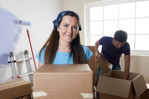 Prepared moving boxes and household items for an Ilford relocation
