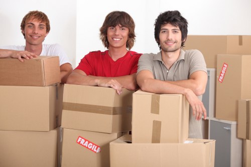 Careful loading of packed boxes and furniture for an Ilford home relocation