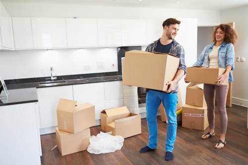 Packed boxes and furniture ready for a residential move in Ilford