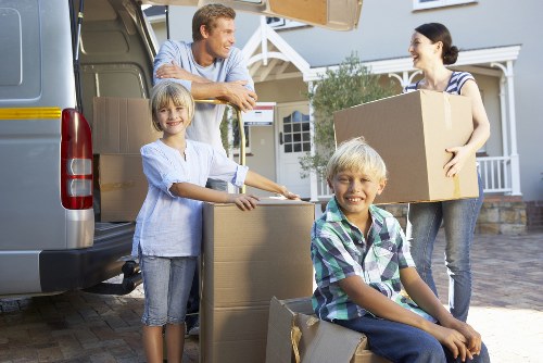 Moving crew transporting desks and IT items during an office move