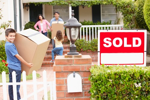 Packed office equipment and furniture prepared for relocation